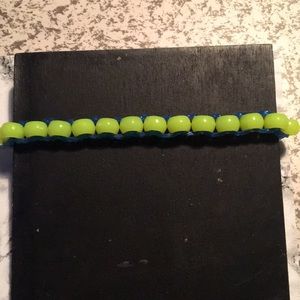 Blue band with yellow bead